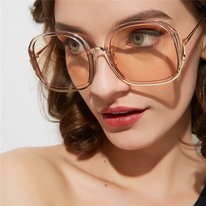 نظارات شمسية ملونة عصرية كبيرة بنصف إطار ملونة للنساء